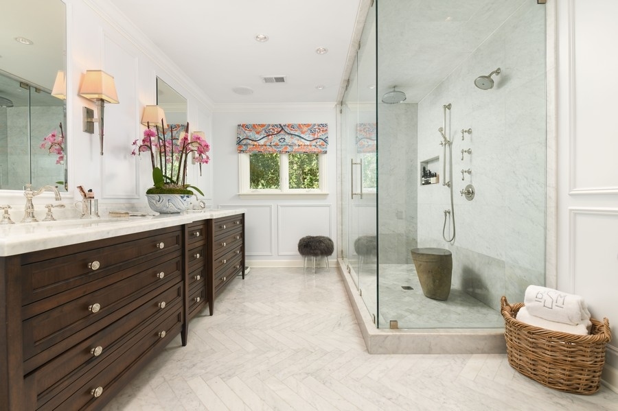 422 Sunset Ridge Road Northfield, IL 60093 - Photo 26 of 52 a bathroom with a sink a toilet and shower