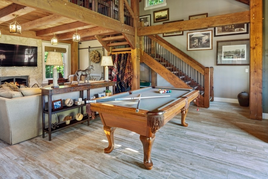 422 Sunset Ridge Road Northfield, IL 60093 - Photo 36 of 52 a living room with furniture and a flat screen tv
