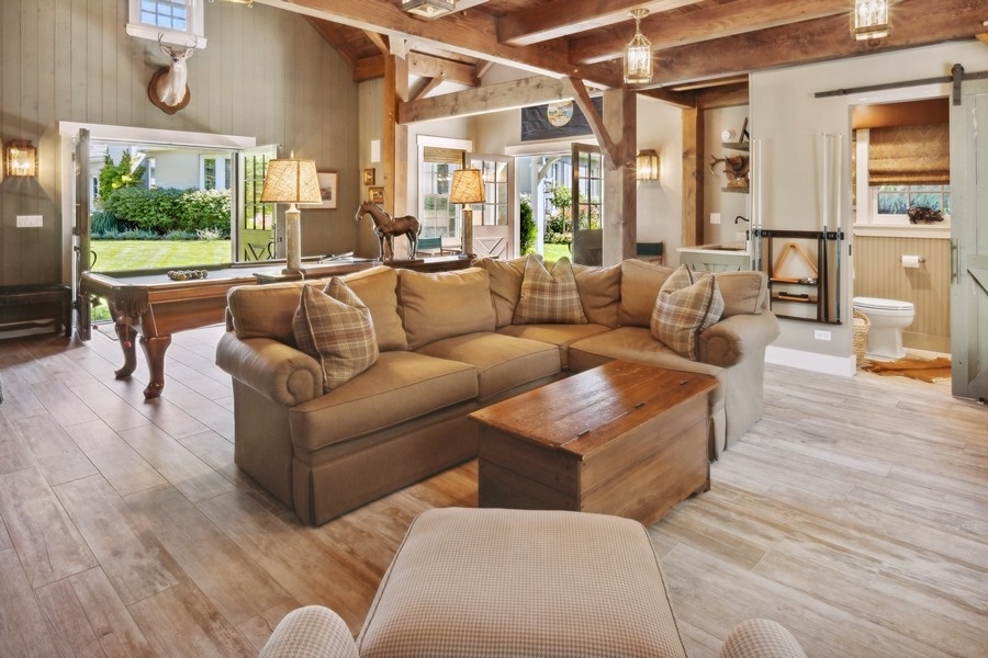 422 Sunset Ridge Road Northfield, IL 60093 - Photo 38 of 52 a living room with furniture and a large window