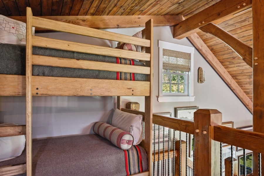 422 Sunset Ridge Road Northfield, IL 60093 - Photo 43 of 52 a view of a porch with wooden floor and iron stairs