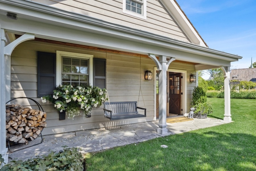 422 Sunset Ridge Road Northfield, IL 60093 - Photo 46 of 52 a front view of a house with garden