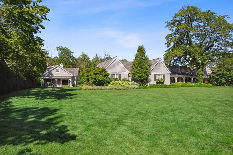 422 Sunset Ridge Road Northfield, IL 60093 - Photo 47 of 52 a front view of a house with garden