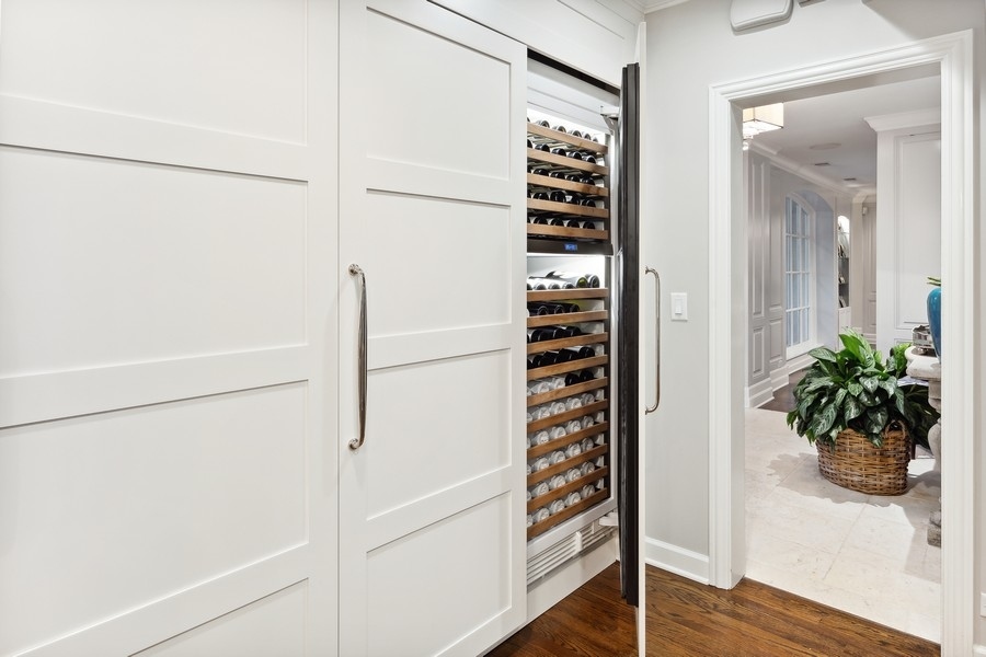 422 Sunset Ridge Road Northfield, IL 60093 - Photo 7 of 52 a view of walk in closet with wooden floor