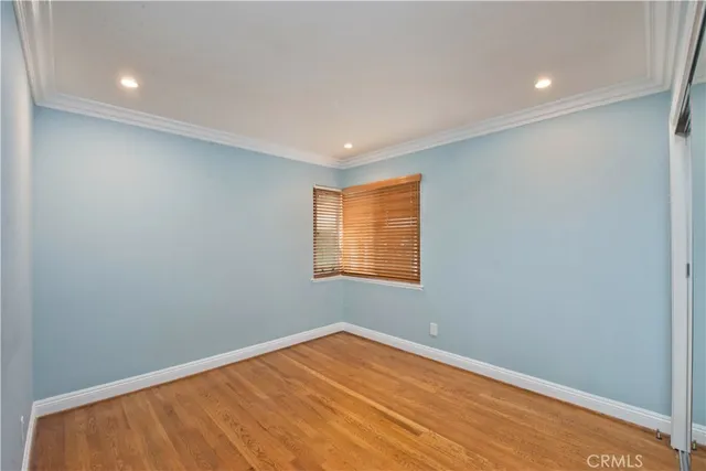 an empty room with a empty space and a window