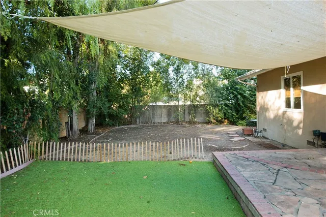 a view of a porch with a yard