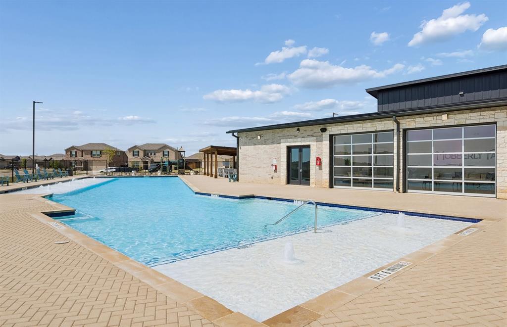14134 Olney Drive Pilot Point, TX 76258 - Photo 22 of 24 Two splash areas in the pool