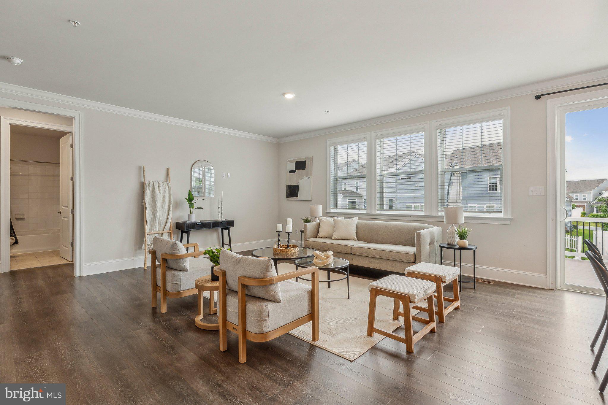 2841 Broad Wing Drive Odenton, MD 21113 - Photo 17 of 71 a living room with fireplace furniture and wooden floor