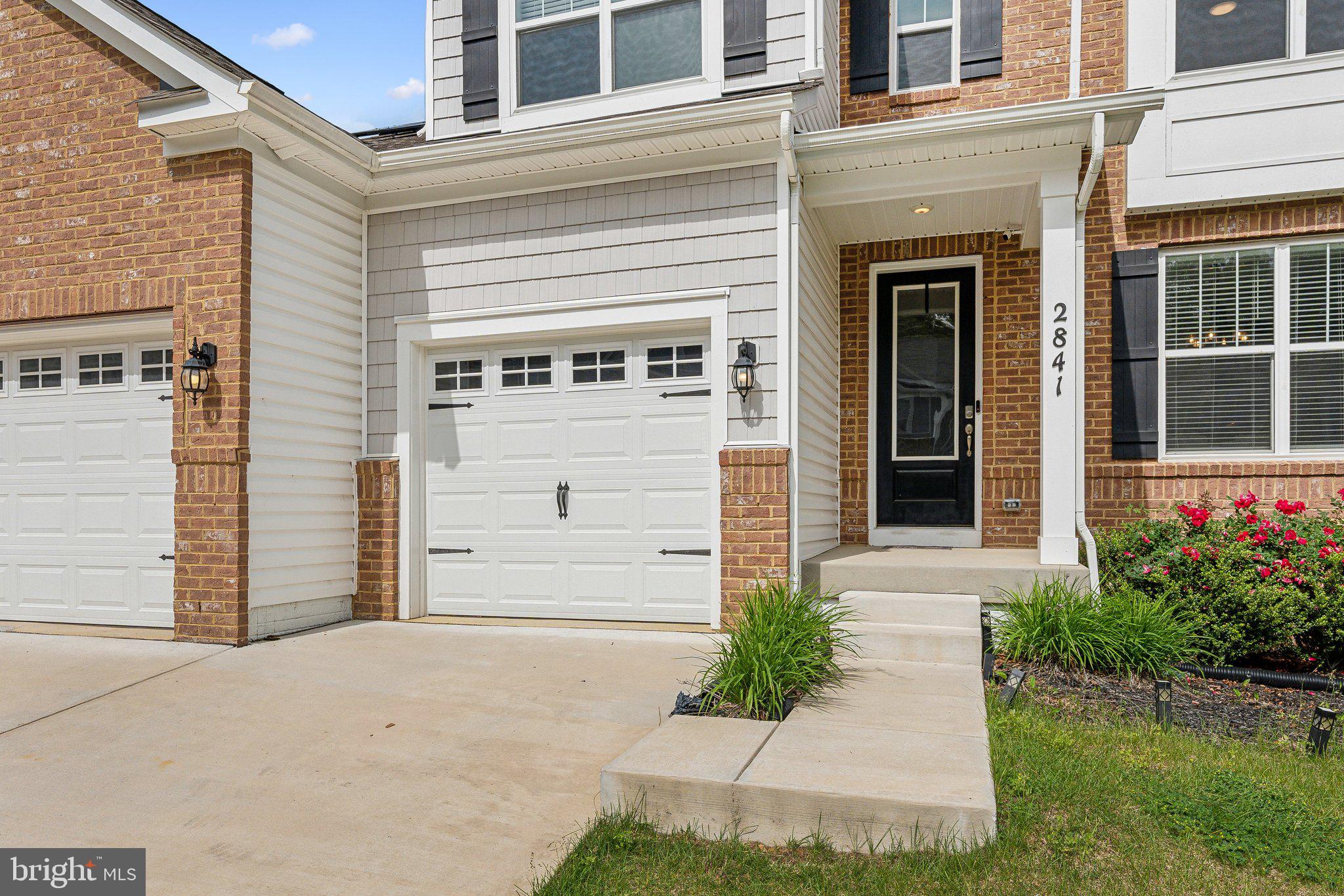 2841 Broad Wing Drive Odenton, MD 21113 - Photo 2 of 71 a house view with a garden space