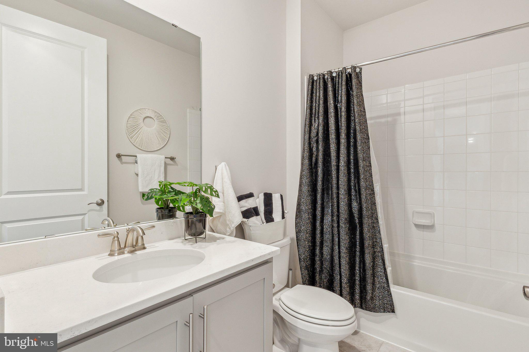 2841 Broad Wing Drive Odenton, MD 21113 - Photo 21 of 71 a bathroom with a sink toilet and shower