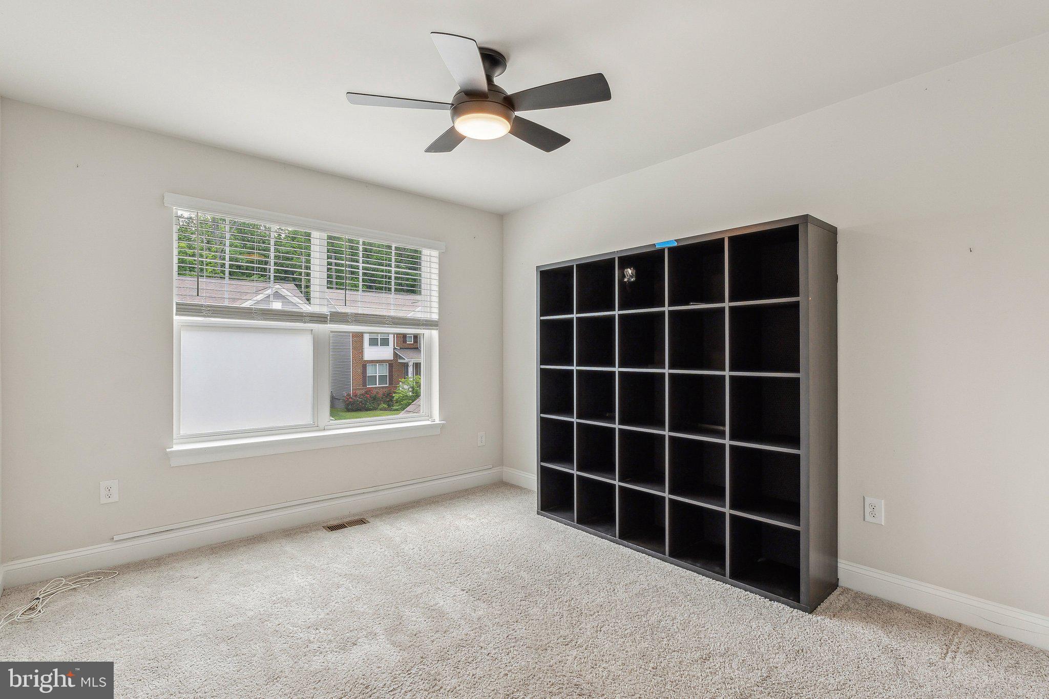 2841 Broad Wing Drive Odenton, MD 21113 - Photo 37 of 71 an empty room with windows and cabinet