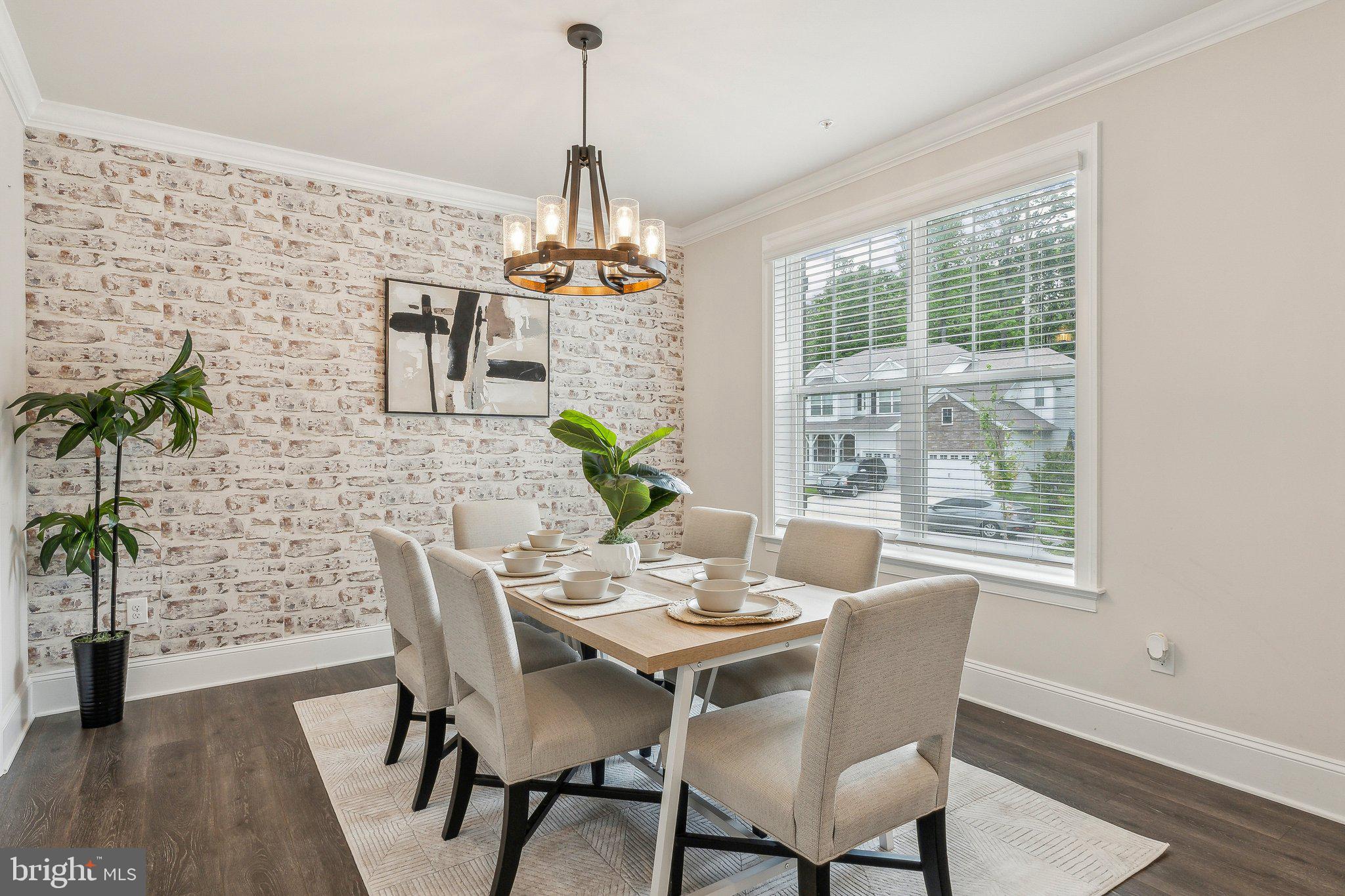 2841 Broad Wing Drive Odenton, MD 21113 - Photo 4 of 71 a view of a dining room with furniture window and wooden floor