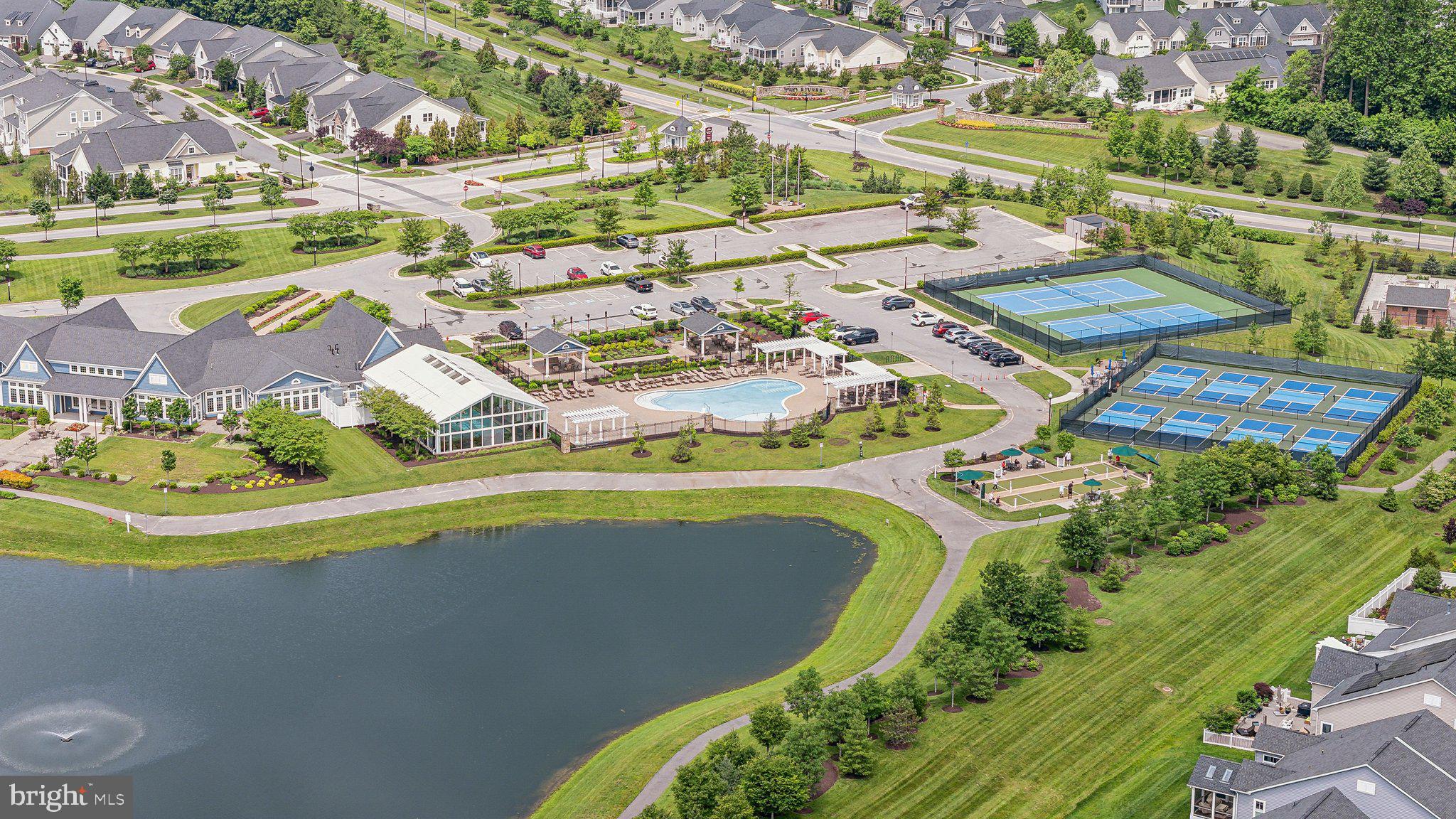 2841 Broad Wing Drive Odenton, MD 21113 - Photo 59 of 71 an aerial view of residential houses with outdoor space and swimming pool