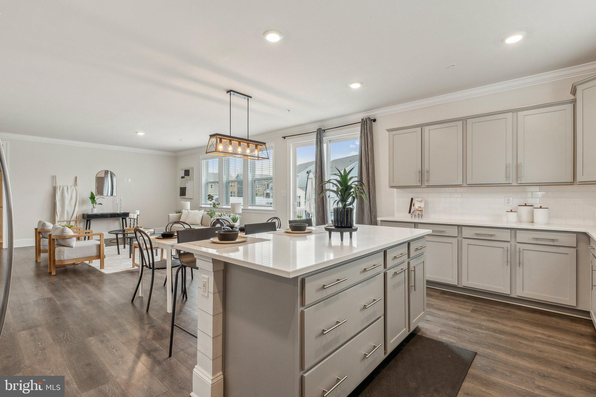 2841 Broad Wing Drive Odenton, MD 21113 - Photo 9 of 71 a kitchen with a sink stove and cabinets