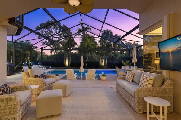a view of a patio with couches and chairs