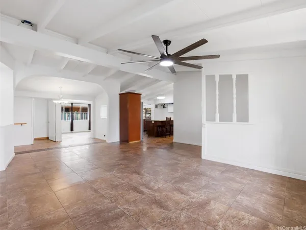 a kitchen with a table and chairs in it