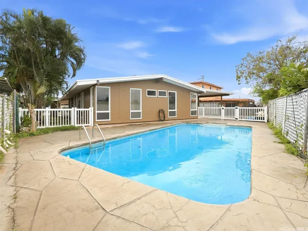 a view of a house with a swimming pool