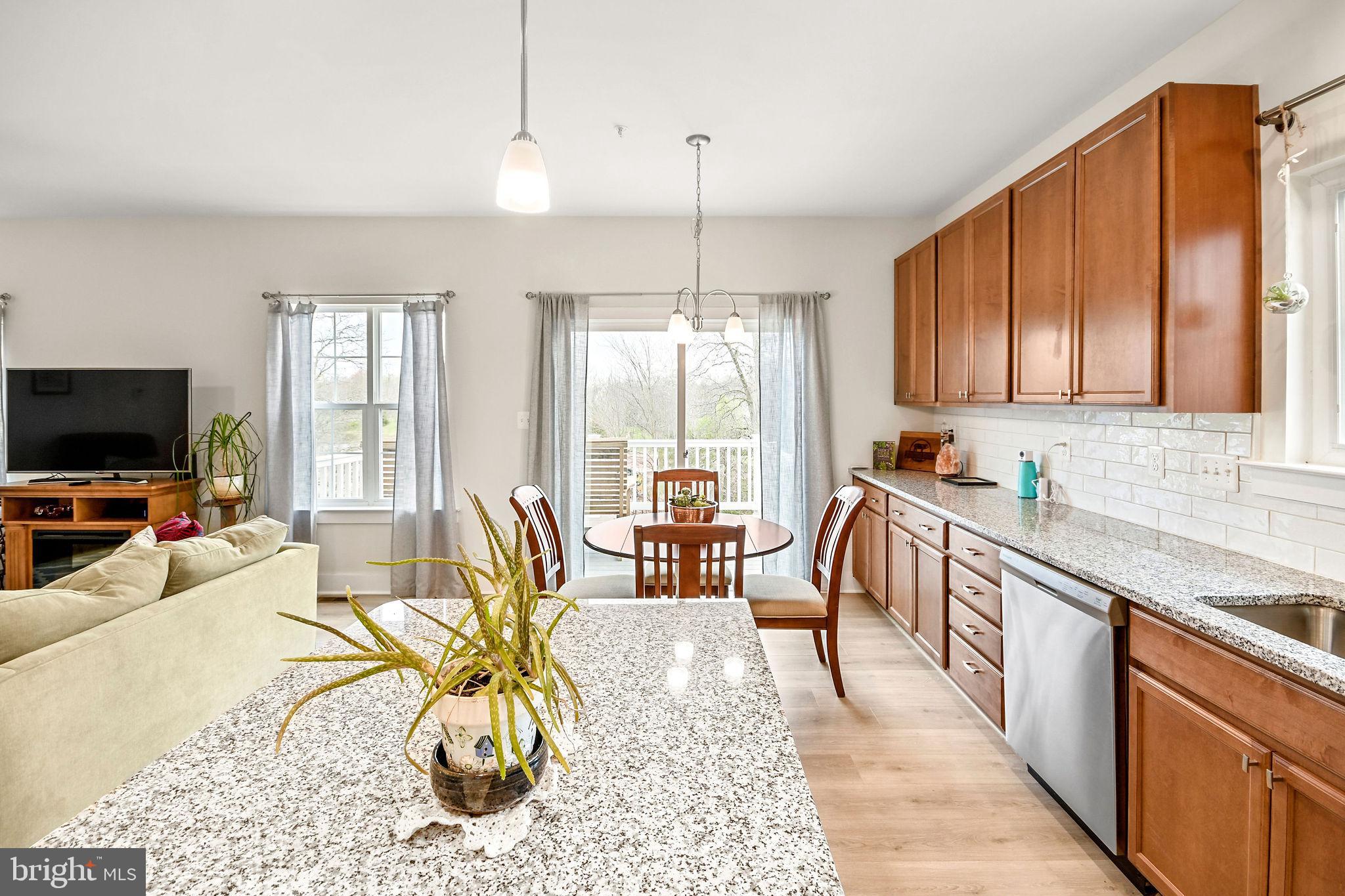 14 Henry House Circle Taneytown, MD 21787 - Photo 13 of 50 Access the west-facing deck from the kitchen