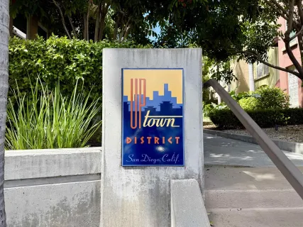 a sign that is on the side of a building