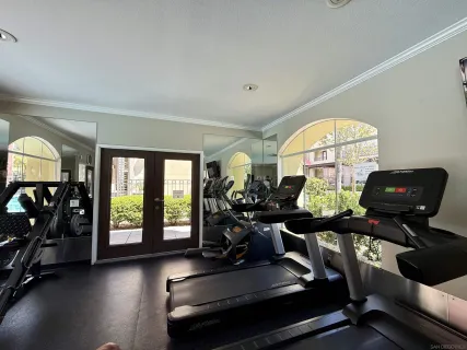 a view of a room with gym equipment
