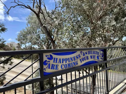 a street sign on the side of building
