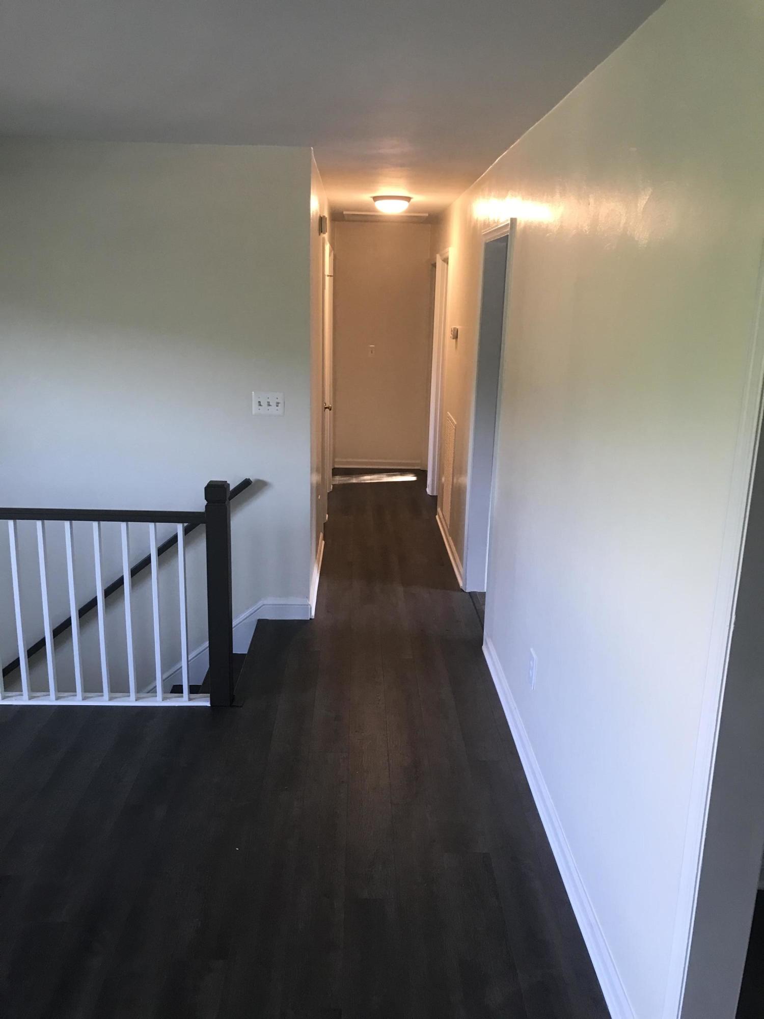 53 Almond Circle Blue Ridge, VA 24064 - Photo 14 of 21 a view of a hallway with wooden floor