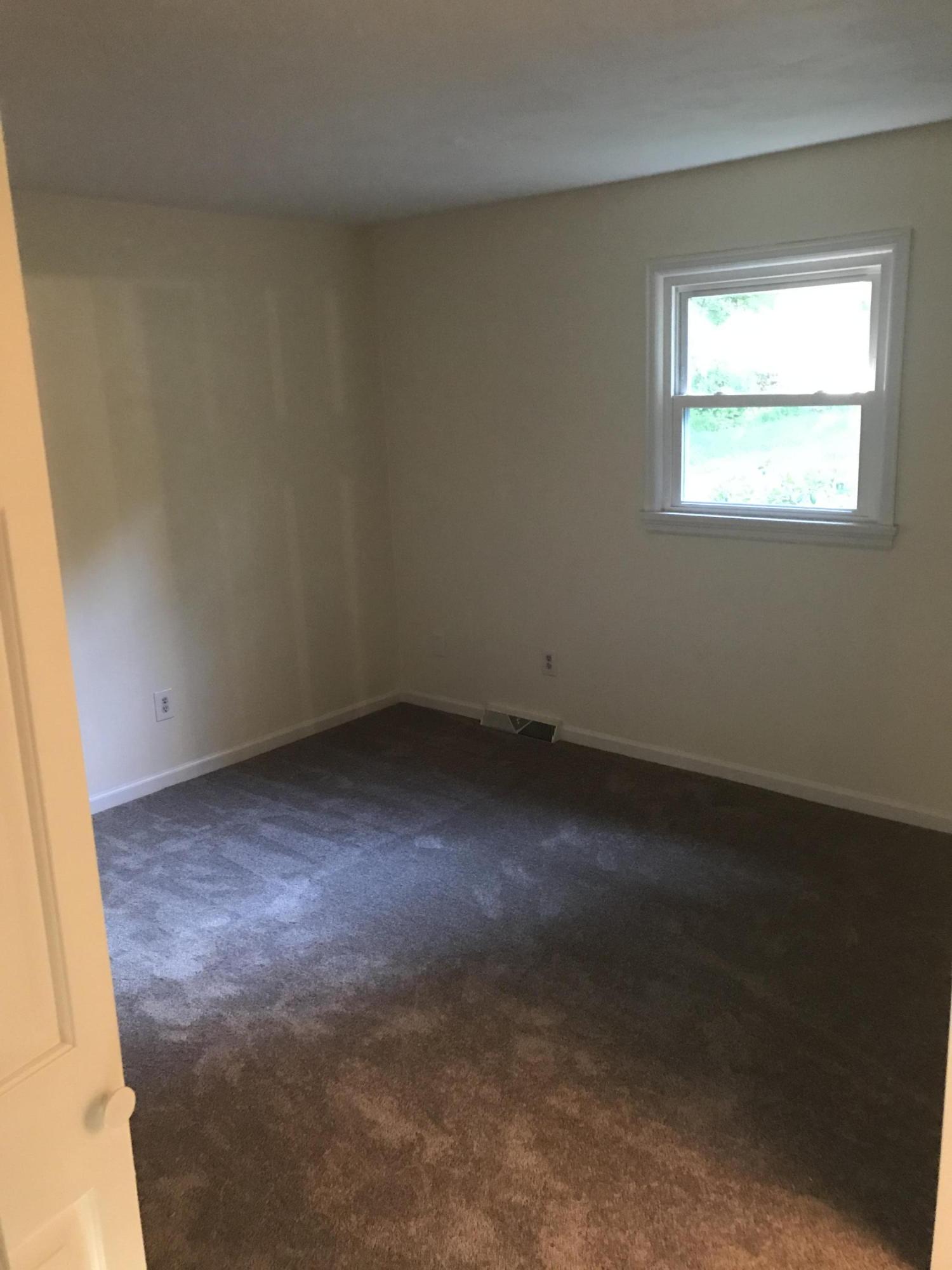 53 Almond Circle Blue Ridge, VA 24064 - Photo 18 of 21 an empty room with a window