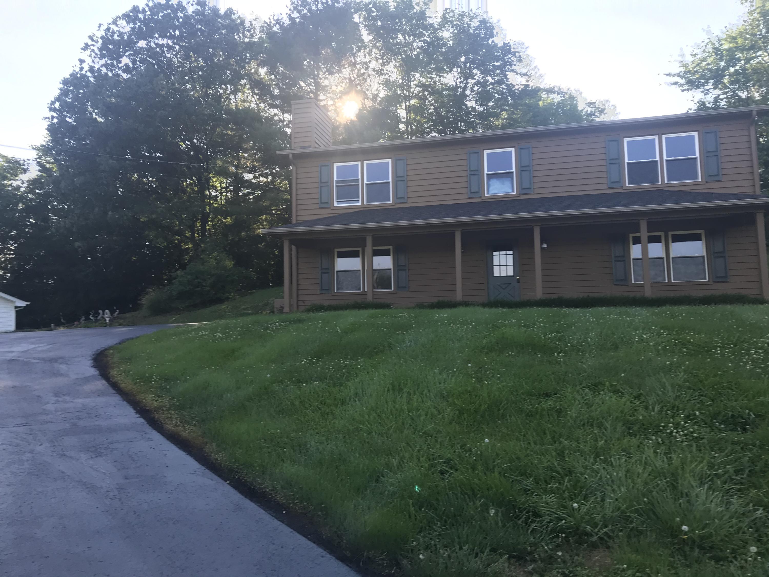 53 Almond Circle Blue Ridge, VA 24064 - Photo 3 of 21 a house view with a garden space