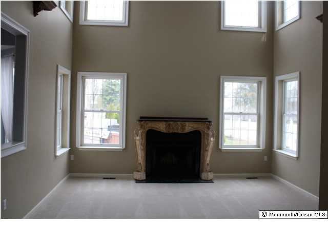 8 Cedar Knoll Road Jackson, NJ 08527 - Photo 11 of 25 a black and white photo of a living room