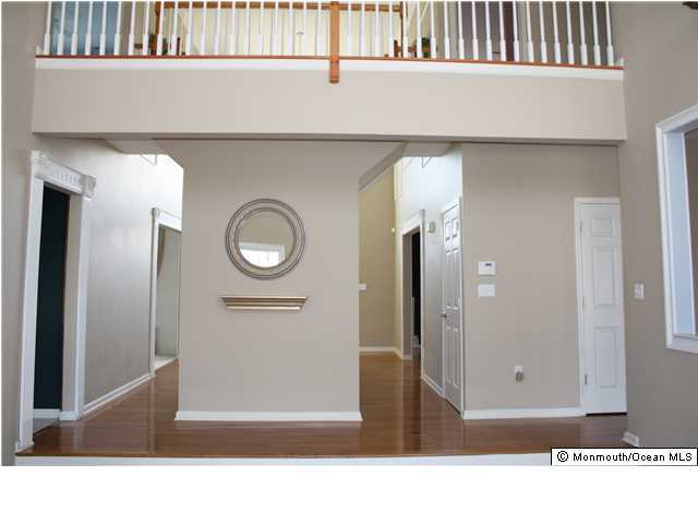8 Cedar Knoll Road Jackson, NJ 08527 - Photo 16 of 25 a black and white photo of a living room