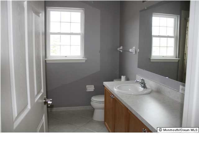 8 Cedar Knoll Road Jackson, NJ 08527 - Photo 21 of 25 a bathroom with a sink toilet and window