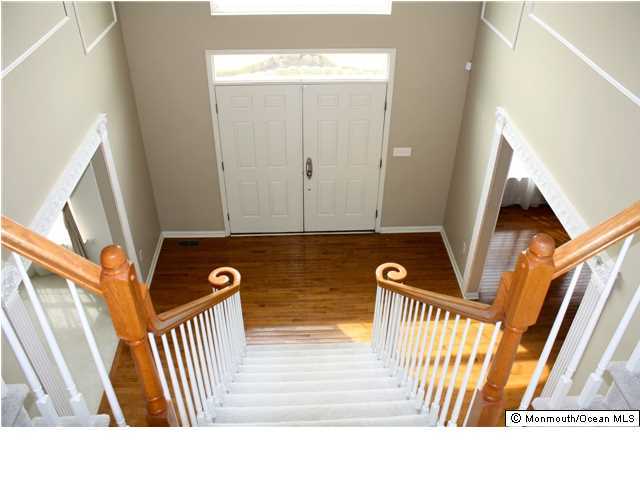 8 Cedar Knoll Road Jackson, NJ 08527 - Photo 5 of 25 a view of front door with stairs