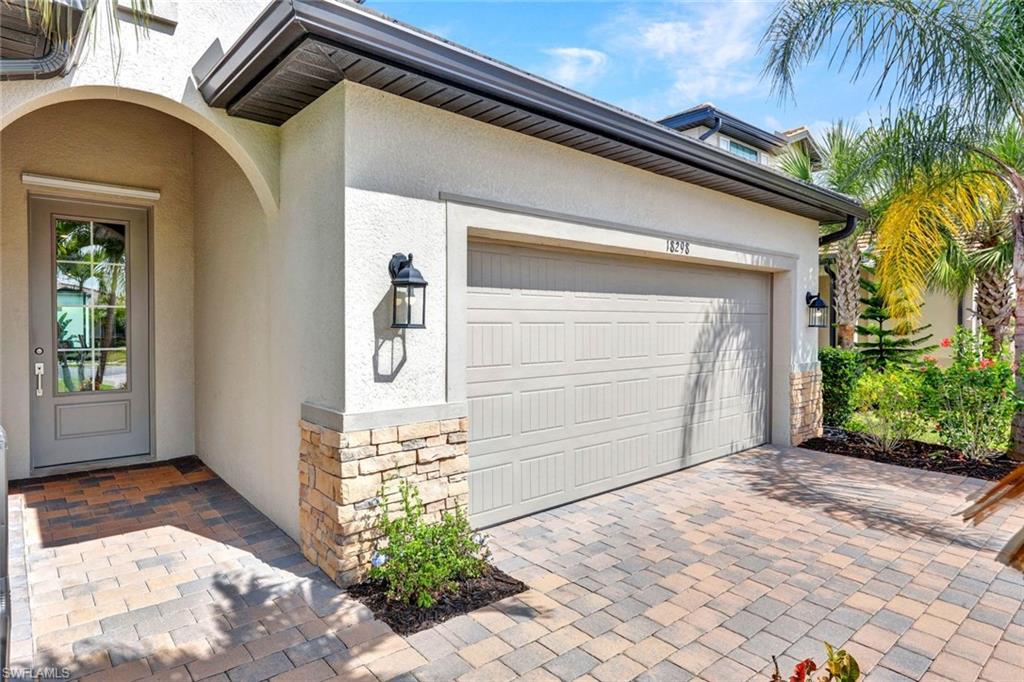 18298 Ridgeline Drive Estero, FL 33928 - Photo 8 of 49 Garage with decorative driveway