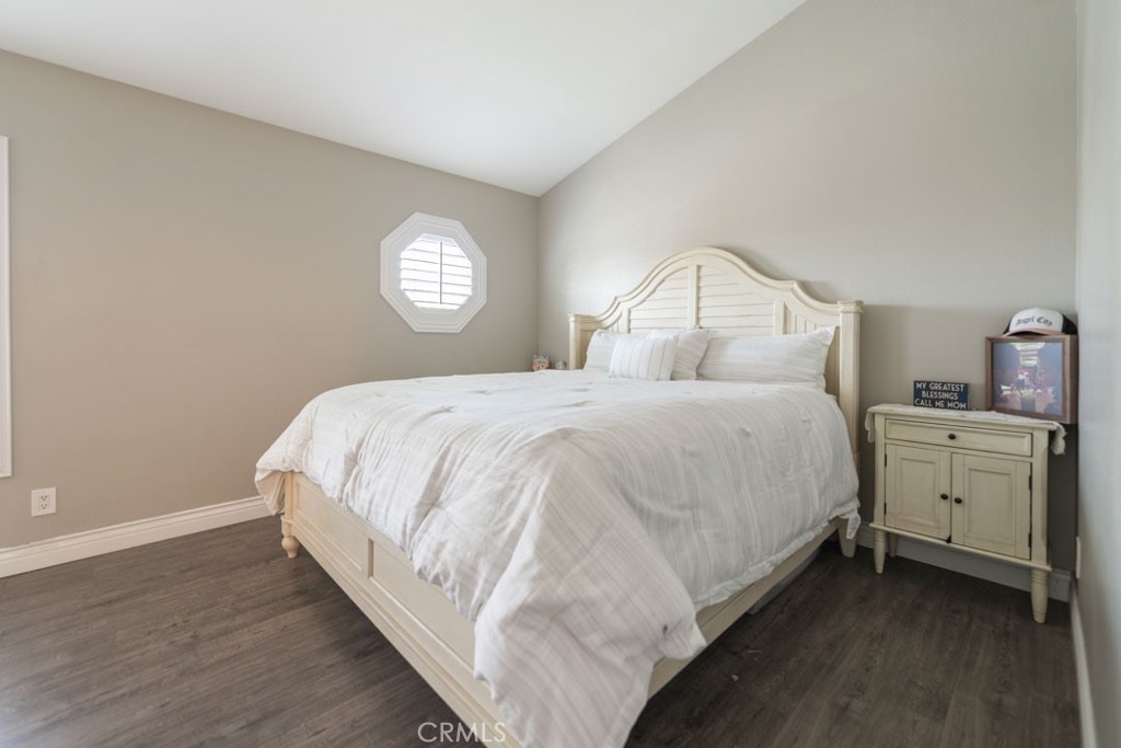 8636 Rancho Cerona Drive Paramount, CA 90723 - Photo 31 of 48 a bedroom with a bed and a window