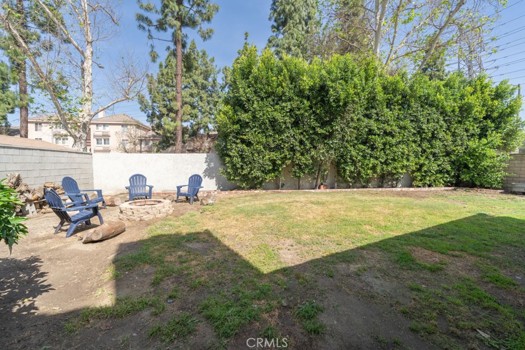 8636 Rancho Cerona Drive Paramount, CA 90723 - Photo 42 of 48 a view of yard with swimming pool and outdoor seating