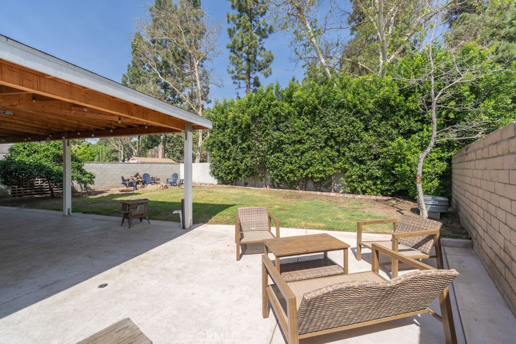 8636 Rancho Cerona Drive Paramount, CA 90723 - Photo 46 of 48 a view of backyard with seating area and green space