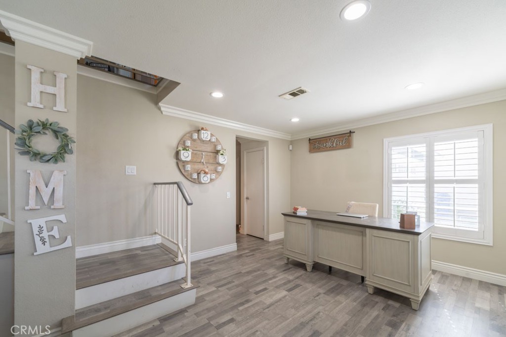 8636 Rancho Cerona Drive Paramount, CA 90723 - Photo 6 of 48 a very nice looking room with a large window and wooden floor