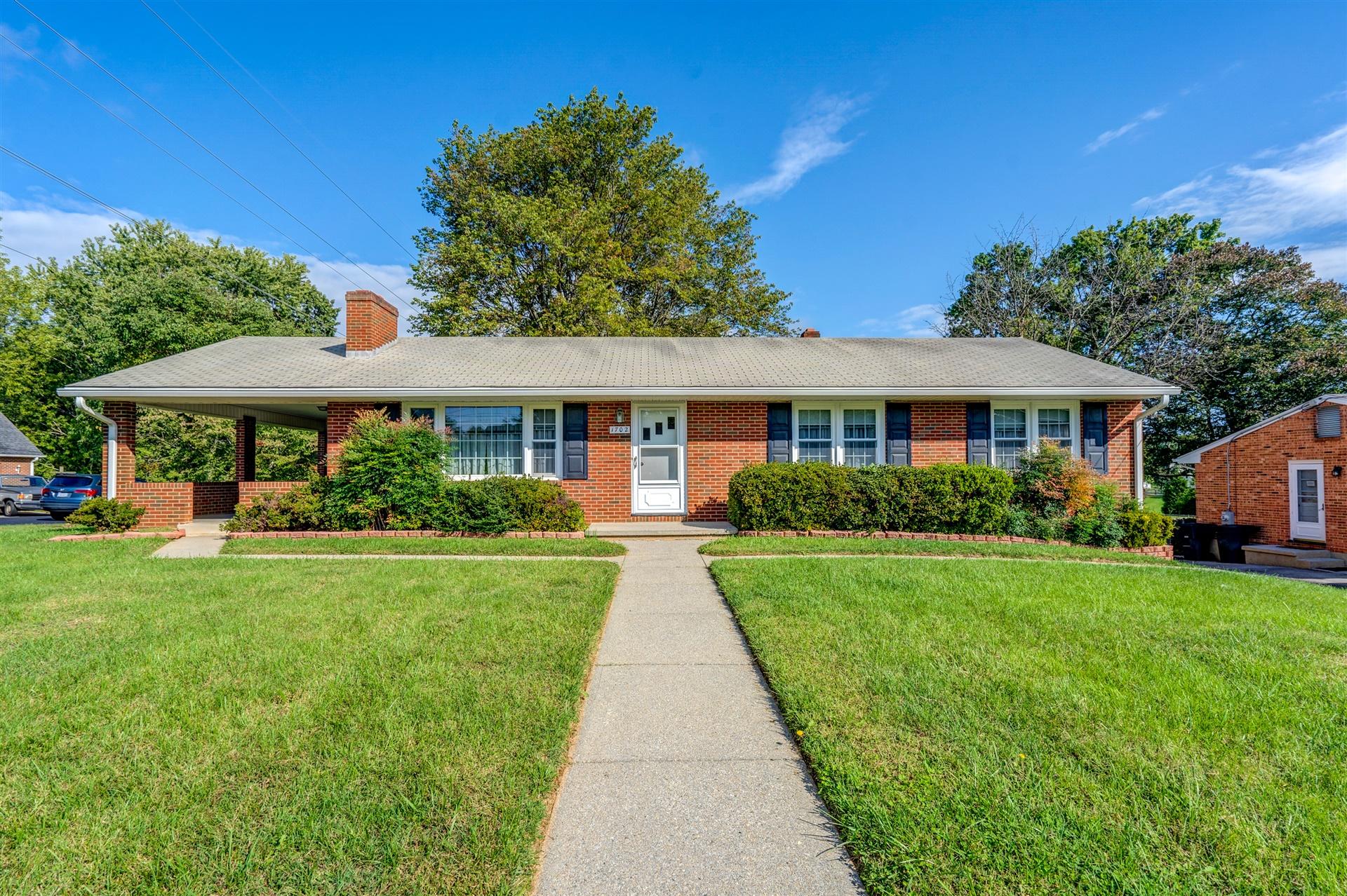 1702 Eanes Road Roanoke, VA 24014 - Photo 1 of 21 a front view of a house with a yard