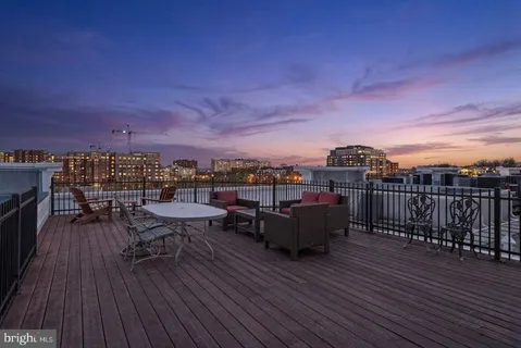 a view of a terrace with seating area