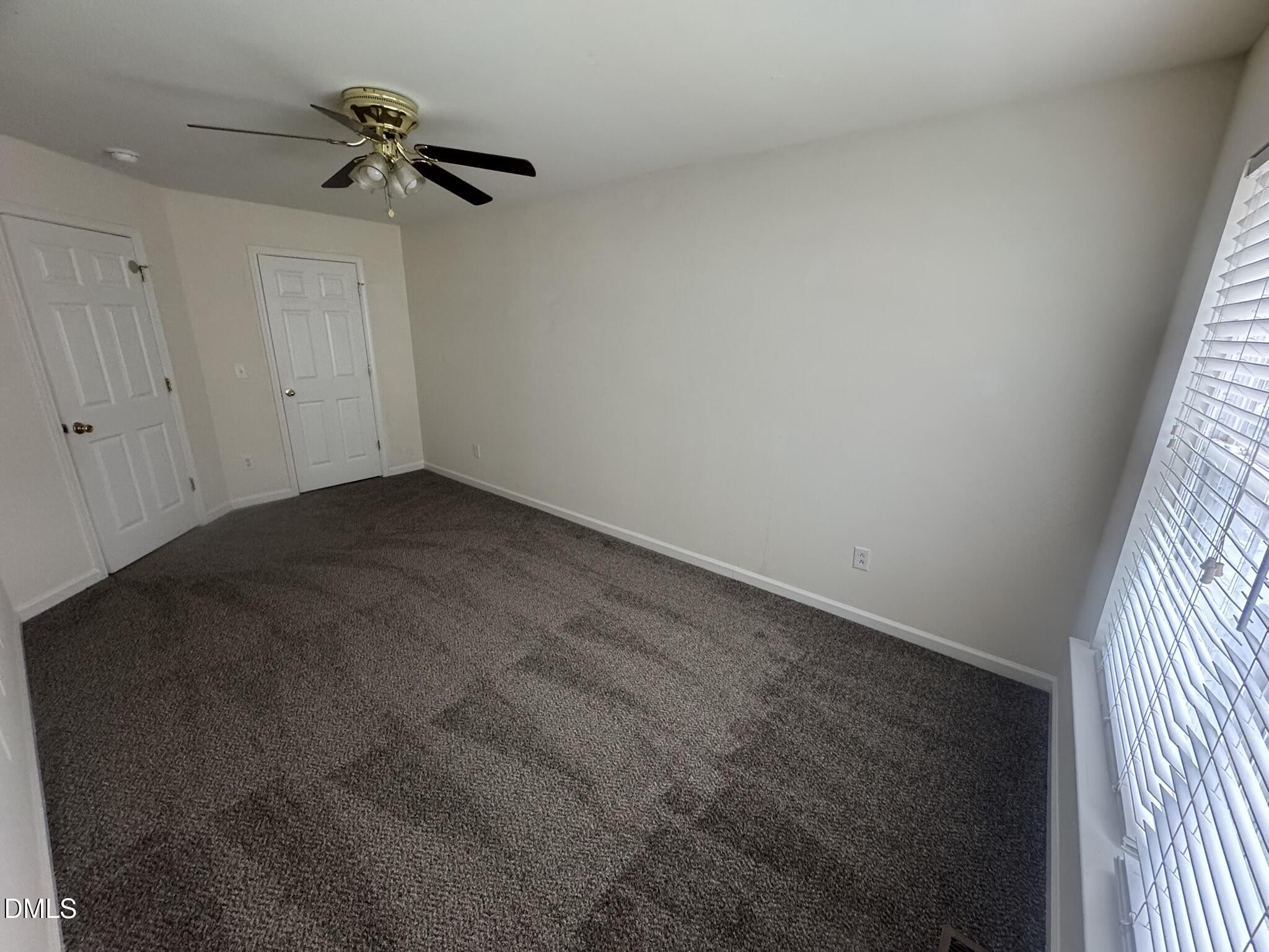 3011 Barrymore Street, Unit 100 Raleigh, NC 27603 - Photo 6 of 9 a view of a room with a window