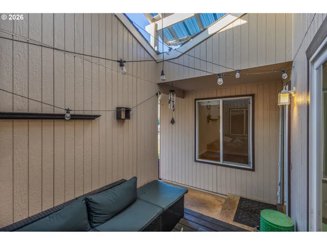 an outdoor view of house with backyard