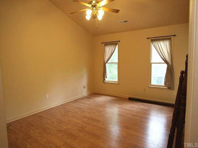 Very Large master bedroom w/hardwood laminate flooring, really great, cathedral ceiling,walk-in closet