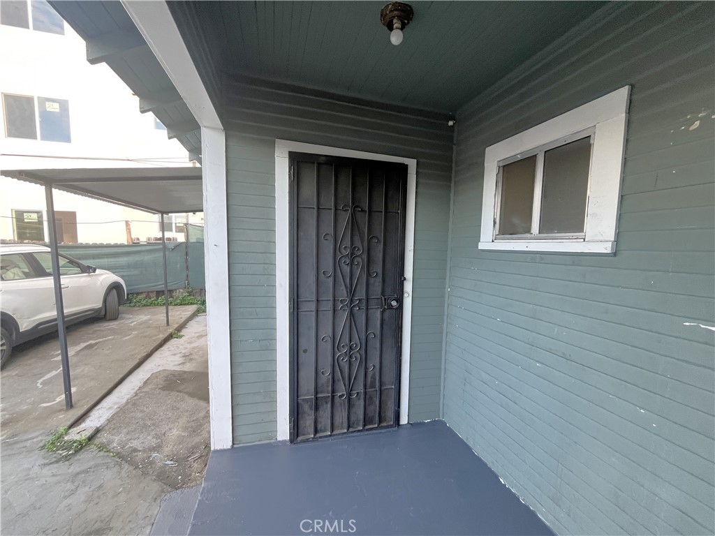 1588 West 37th Street, Unit 1/2 Los Angeles, CA 90018 - Photo 3 of 17 a view of a balcony