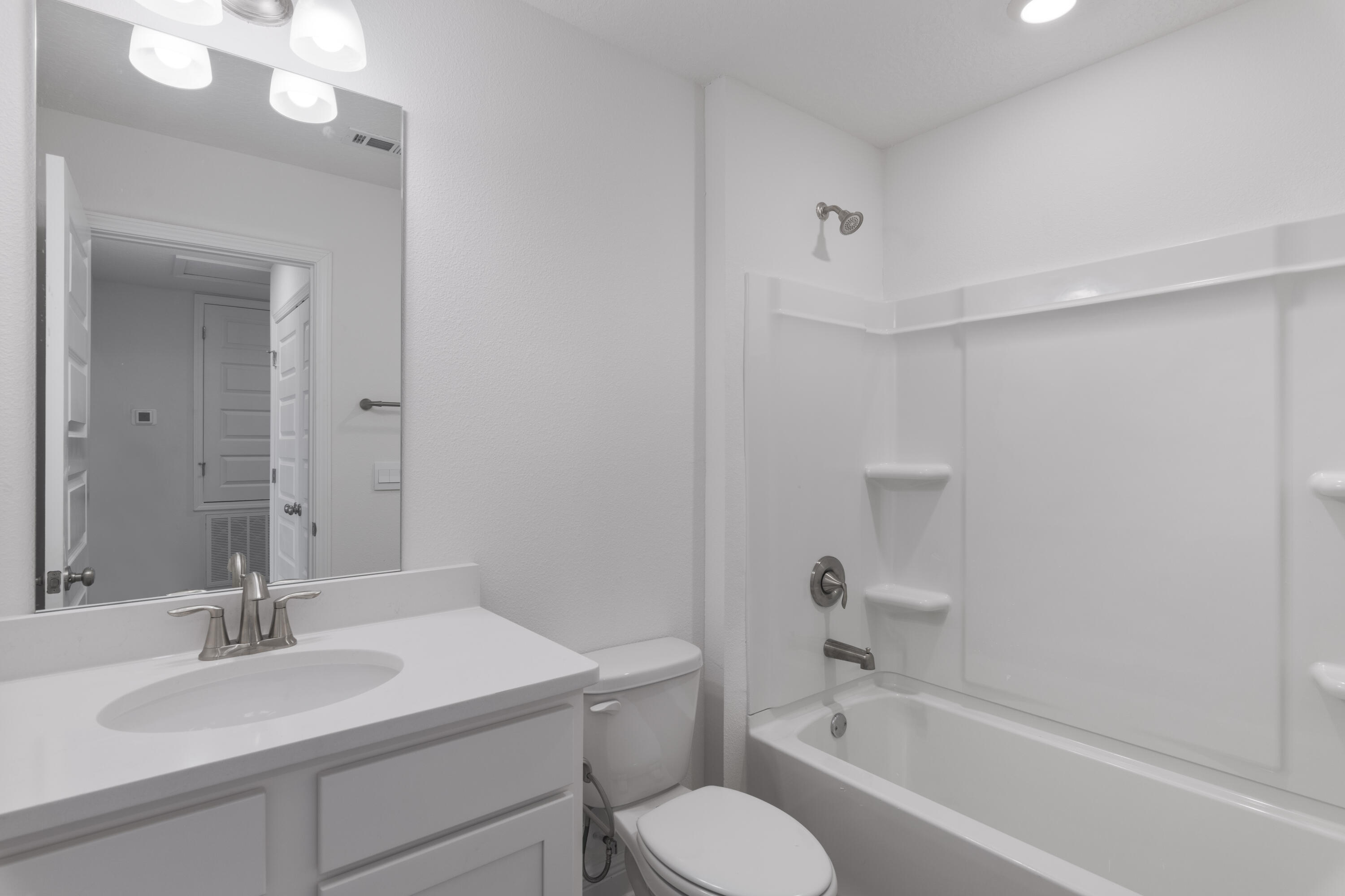 4 Renea Cove Destin, FL 32541 - Photo 20 of 21 a bathroom with a sink toilet tub and shower