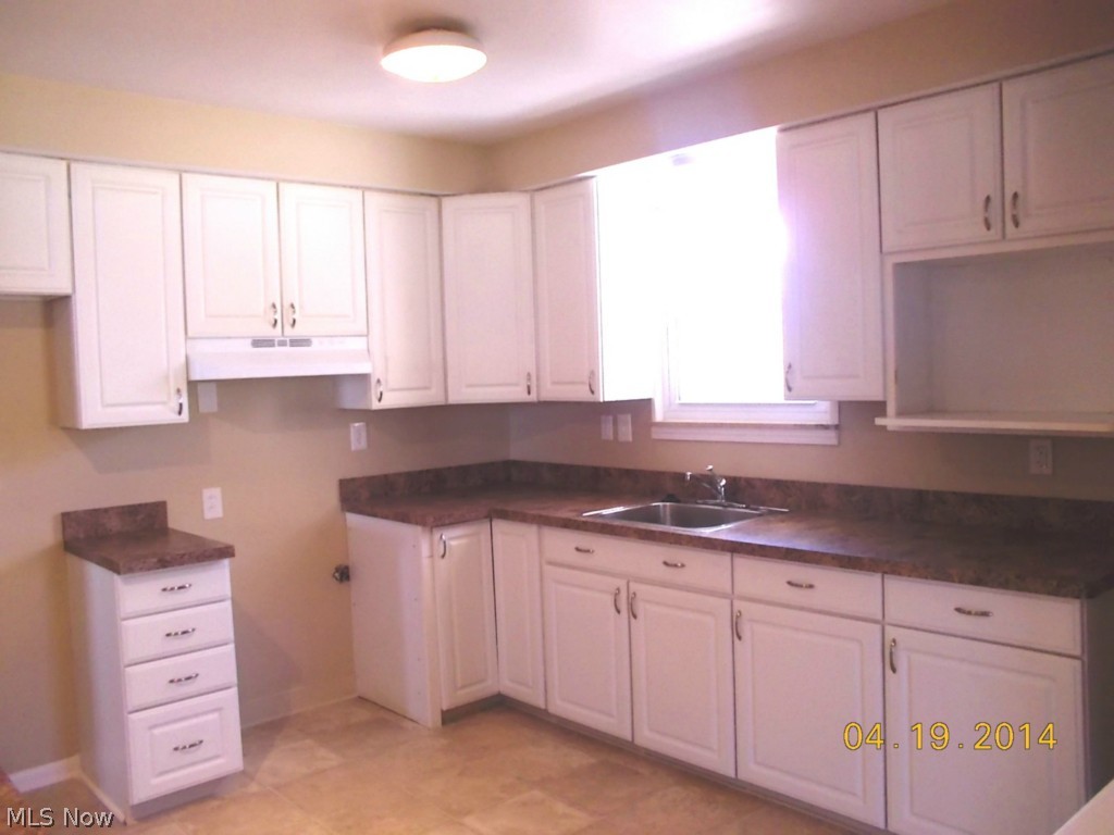 783 Edgewood Road Cleveland, OH 44143 - Photo 5 of 22 Only a portion of the kitchen made it into this photo. Look at the beautiful cabinets, hardware and flooring!