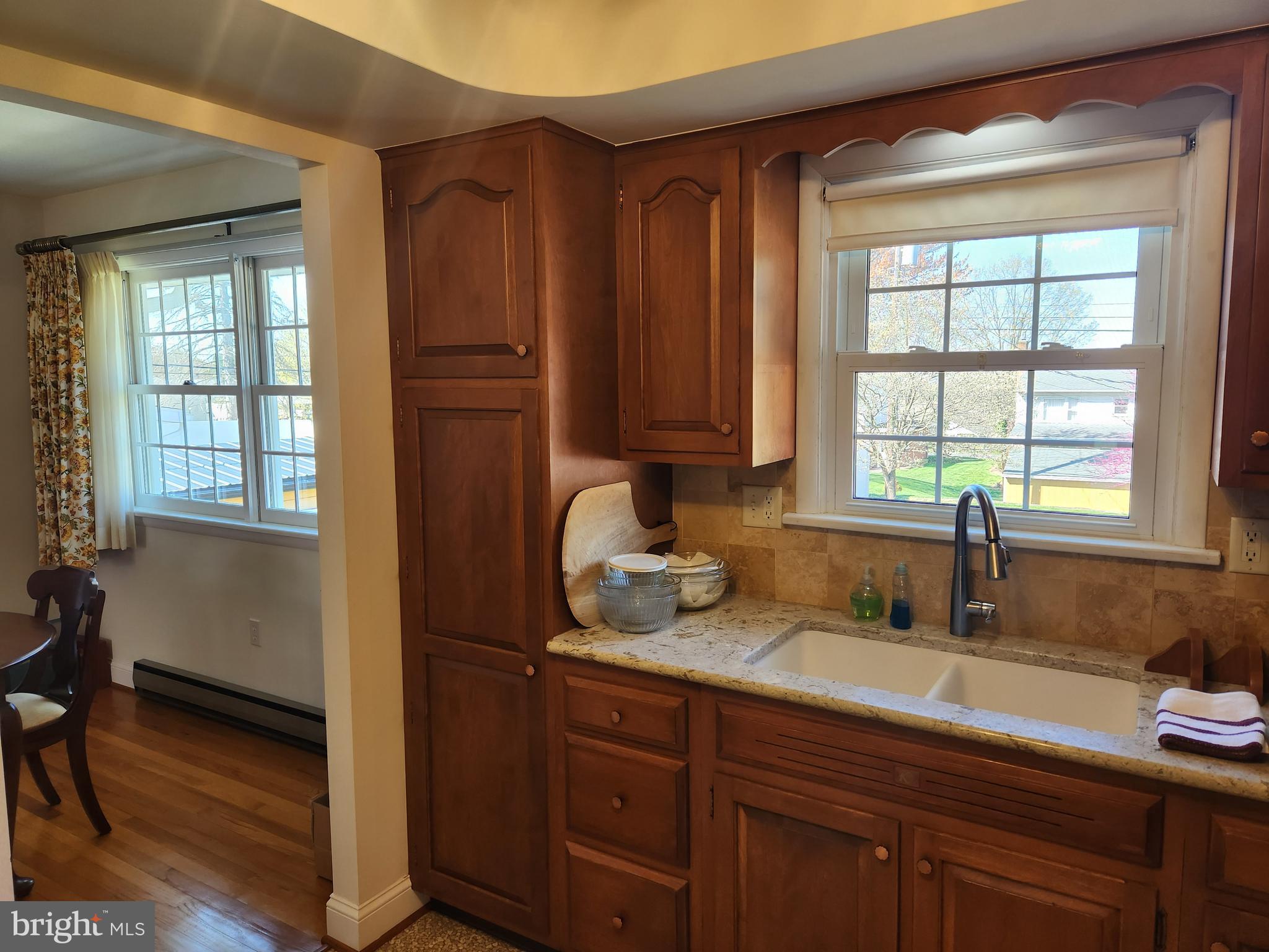 1116 Devonshire Road Lancaster, PA 17601 - Photo 13 of 70 a kitchen with stainless steel appliances granite countertop wooden cabinets a sink and a window