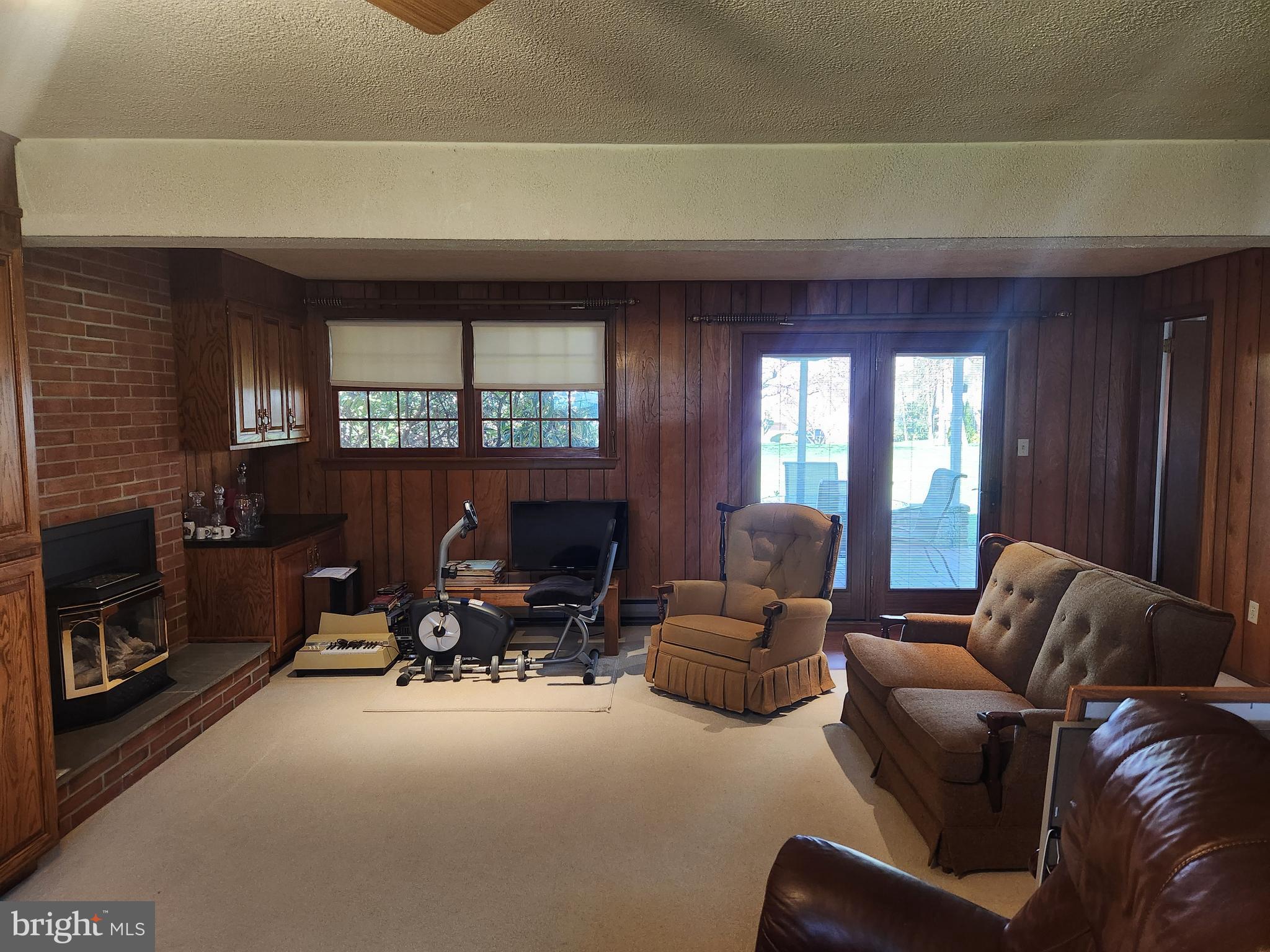 1116 Devonshire Road Lancaster, PA 17601 - Photo 28 of 70 a living room with furniture and a fireplace