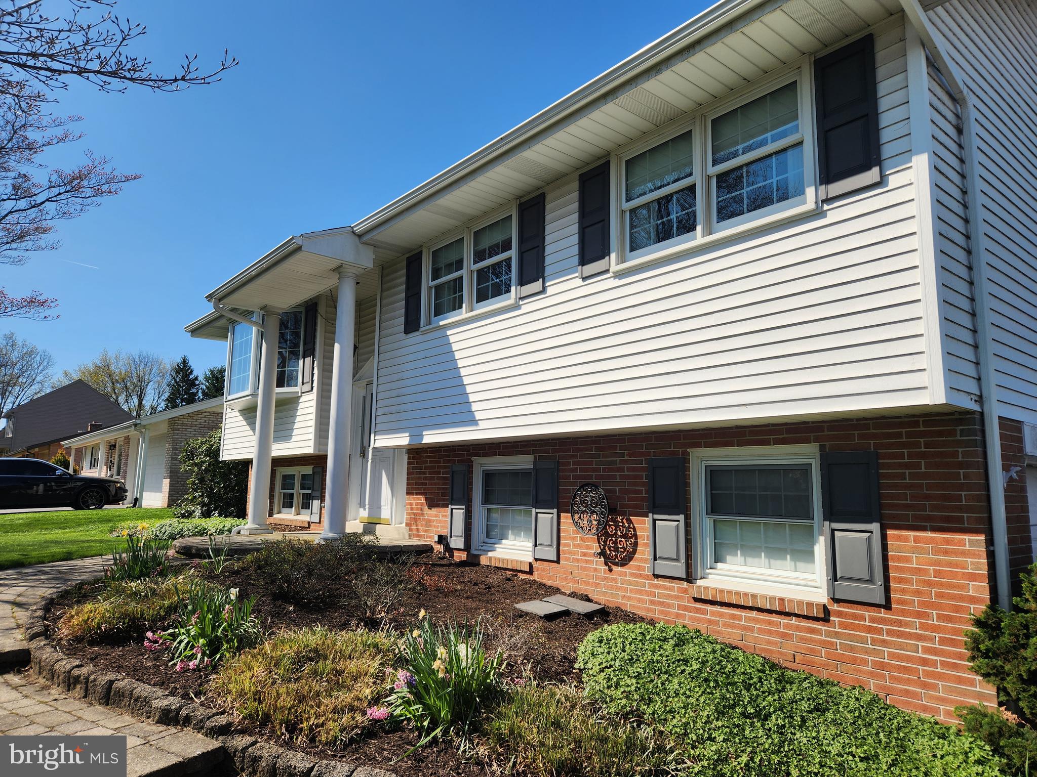 1116 Devonshire Road Lancaster, PA 17601 - Photo 38 of 70 a front view of a house with a garden