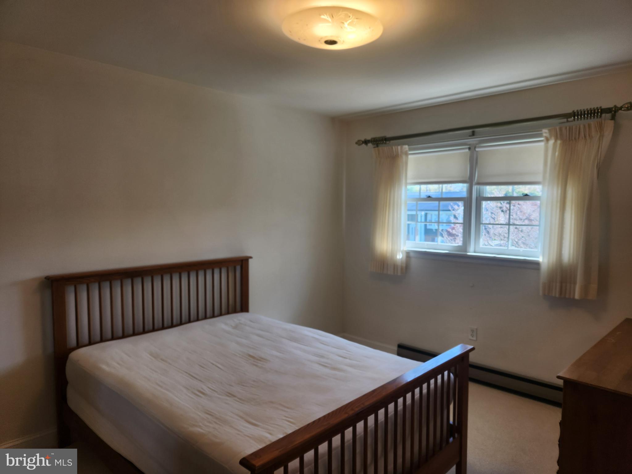 1116 Devonshire Road Lancaster, PA 17601 - Photo 4 of 70 a bedroom with a bed and window