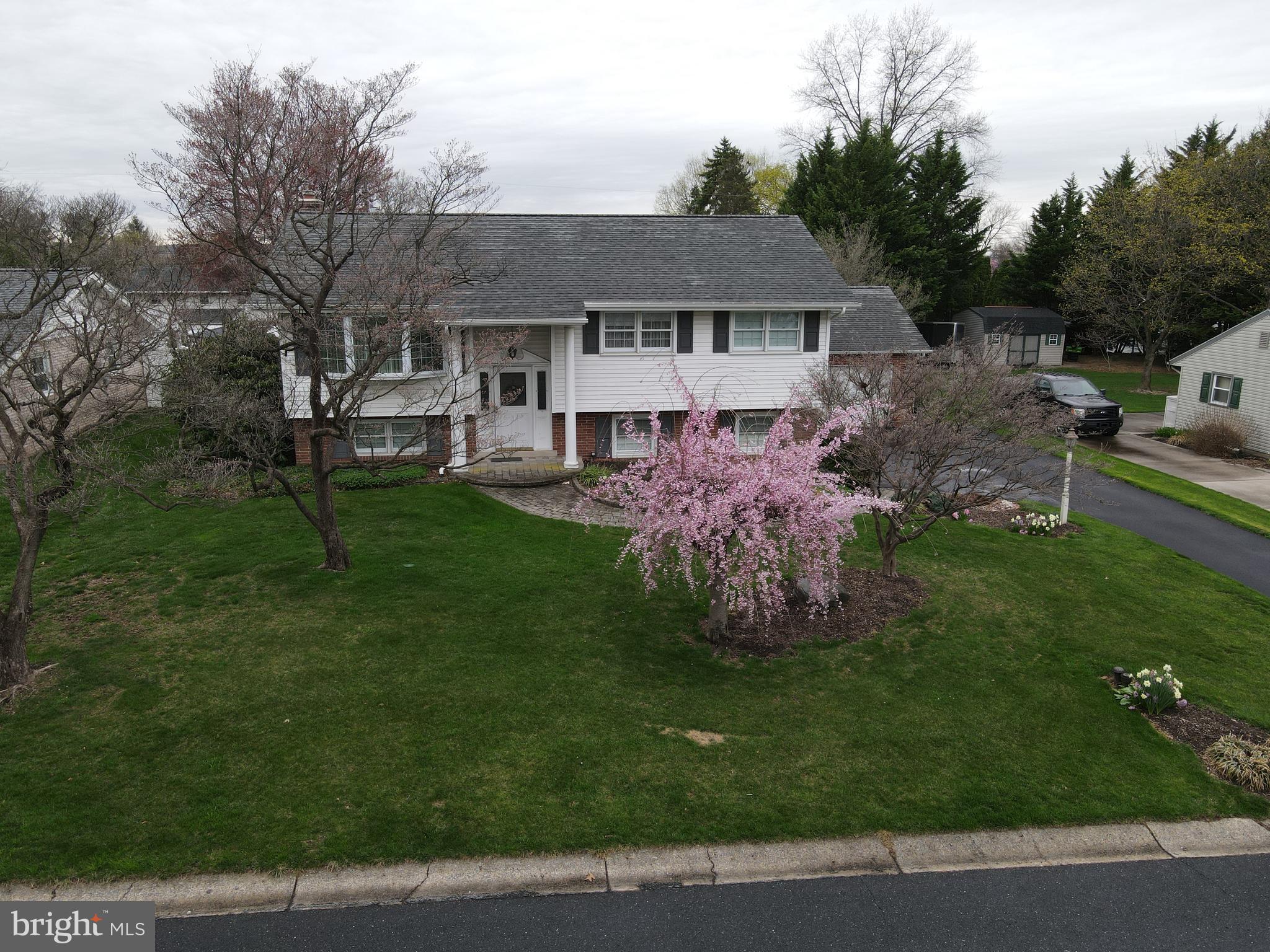1116 Devonshire Road Lancaster, PA 17601 - Photo 50 of 70 a view of a house with a yard and sitting area