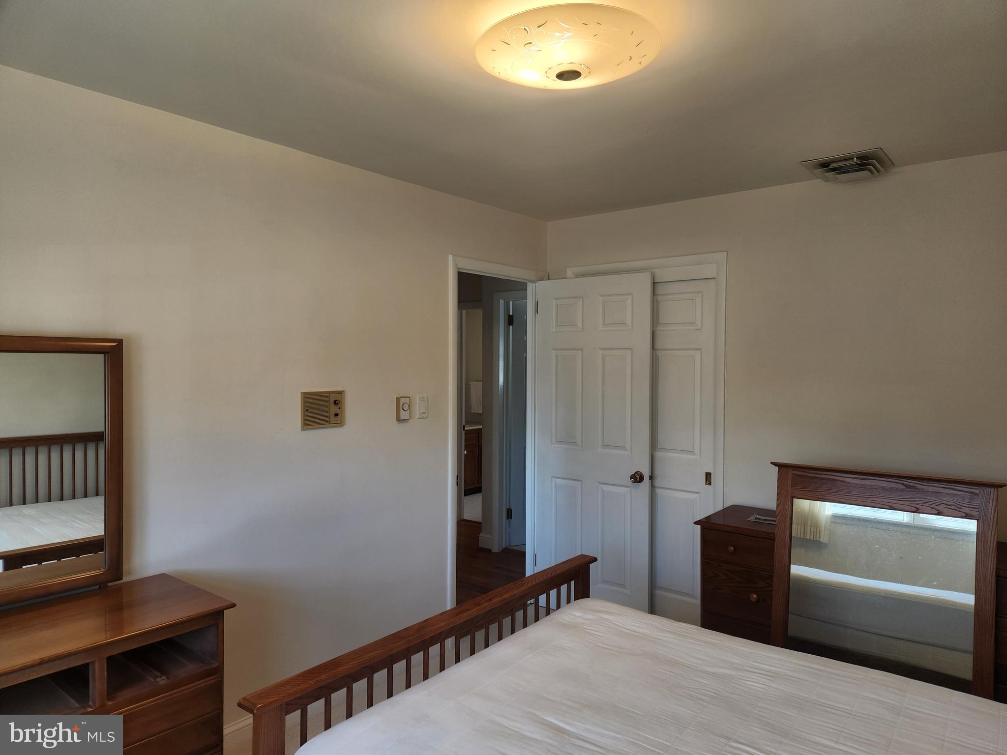 1116 Devonshire Road Lancaster, PA 17601 - Photo 5 of 70 a bedroom with a bed and a lamp on the dresser